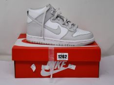 A pair of youths as new Nike Dunk High (UK 5).