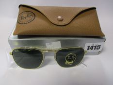 A pair of as new Ray Ban Frank sunglasses.