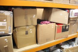 Nine boxes of pre-owned clothing and related items.