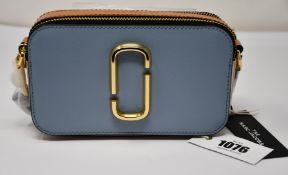 An as new Marc Jacobs Snapshot bag in skyline blue.