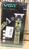 Four boxed as new VGR Voyager V-085 professional hair trimmers.
