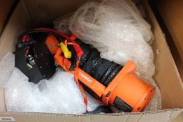 A pre-owned Rhino Winch 13500 (Damaged).