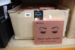 A box of Aovshey magnetic eyeliner and eyelashes (Approximately 45 items).