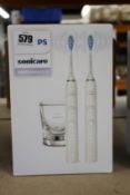 A boxed as new Philips Sonicare 9000 diamond clean electric toothbrush.