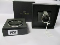 An as new Waldor & Co Original 40 Cote d'Azur watch and a square bangle.
