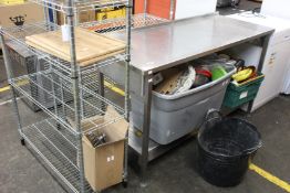 A stainless steel preparation table, two sets of wire shelving, Sony multi channel AV receiver and