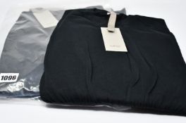 Three items of as new MRZ clothing; pullover (XS), skirt (M) and Bermuda shorts (XS).