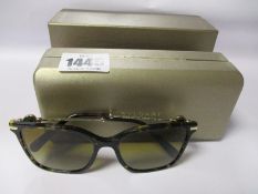 A pair of as new Bvlgari sunglasses.