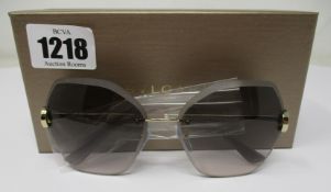 A pair of as new Bvlgari sunglasses.