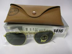 A pair of as new Ray Ban Frank sunglasses.