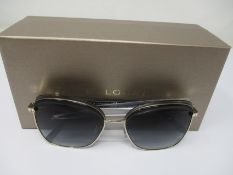A pair of as new Bvlgari sunglasses.