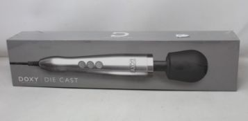 A boxed as new Doxy - Die Cast - Solid Metal Plug-In Vibrating Wand Massager (Over 18s only).