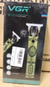 Four boxed as new VGR Voyager V-085 professional hair trimmers.