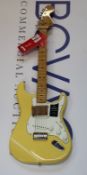 An as new Fender Vintera Series '70s Stratocaster' electric guitar in Buttercream with carry case/