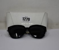 A pair of as new Michael Kors sunglasses.