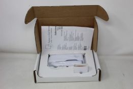 A boxed as new Welch Allyn Braun ThermoScan PRO 6000 ear thermometer with cradle.