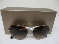 A pair of as new Bvlgari sunglasses.