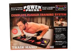 Four boxed as new Train Hard - Power Press - Complete Push-Up Training Systems.