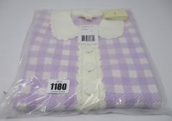 An as new Maje Micro jacquard-knit polo shirt (T3).