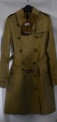 A women's as new Burberry Kensington trench coat in honey (Size 8/EU 40 - RRP £1650).