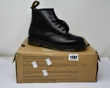 A pair of as new Dr Martens 101 6 Eye boots (UK 8).