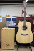 A SX custom MG1K/NA acoustic guitar (Impact damage to back of guitar) and a percussion box.