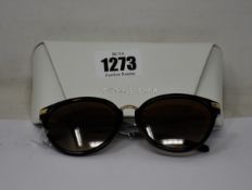 A pair of as new Michael Kors sunglasses.
