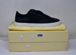 A pair of as new Axel Arigato Clean 90 sneakers in dark blue (UK 9.5).