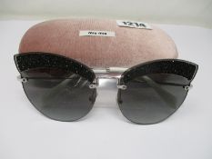 A pair of as new Miu Miu sunglasses.