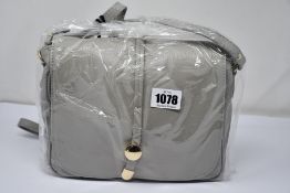 Four as new Renata Corsi handbags.