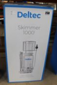A boxed as new Deltec 1000i protein skimmer.