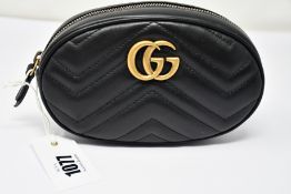 An as new Gucci Beltbag in black with dust bag (RRP £865).