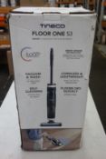 A Tineco Floor One S3 - Smart Cordless Vacuum and Wash.