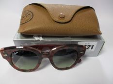 A pair of as new Ray Ban Roundabout sunglasses.