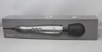 A boxed as new Doxy - Die Cast - Solid Metal Plug-In Vibrating Wand Massager (Over 18s only).