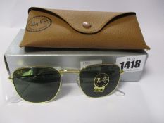 A pair of as new Ray Ban Frank sunglasses.