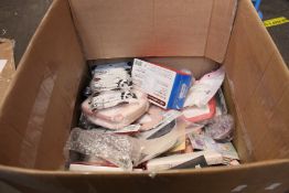 A box of assorted beauty accessorises to include sleep eye masks, massage tools, eyelashes, tooth