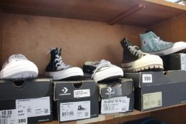 Five pairs of as new Converse canvas footwear.