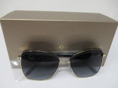 A pair of as new Bvlgari sunglasses.