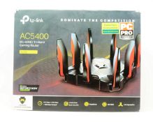 A boxed as new TP-Link Archer C5400X AC5400 Tri-Band Gaming Router (EU model) (Box opened, damage to