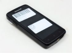 A pre-owned Honeywell Scanpal EDA50-111-C121NGO Hand Held Computer/Barcode Scanner (Missing