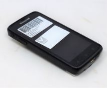 A pre-owned Honeywell Scanpal EDA50-111-C121NGO Hand Held Computer/Barcode Scanner (Missing