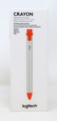 A boxed as new Logitech Crayon for iPad in Silver/Orange (Box opened).
