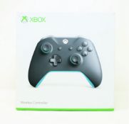 A boxed as new Microsoft Xbox One S Wireless Controller in Grey Blue (P/N: WL3-00106).