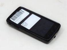 A pre-owned Honeywell Scanpal EDA50-111-C121NGO Hand Held Computer/Barcode Scanner (Missing