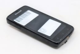 A pre-owned Honeywell Scanpal EDA50-111-C121NGO Hand Held Computer/Barcode Scanner (Missing
