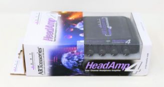 Two boxed as new ART 4-Output Headamp 4 Headphone Amplifiers (One box with significant damage).