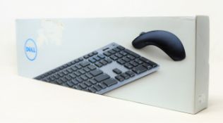 A boxed as new Dell KM717 Premier Keyboard And Mouse Set (QWERTY - UK) (Box sealed, some cosmetic