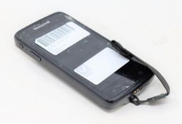A pre-owned Honeywell Scanpal EDA50-111-C121NGO Hand Held Computer/Barcode Scanner (Missing