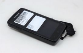 A pre-owned Honeywell Scanpal EDA50-111-C121NGO Hand Held Computer/Barcode Scanner (Missing